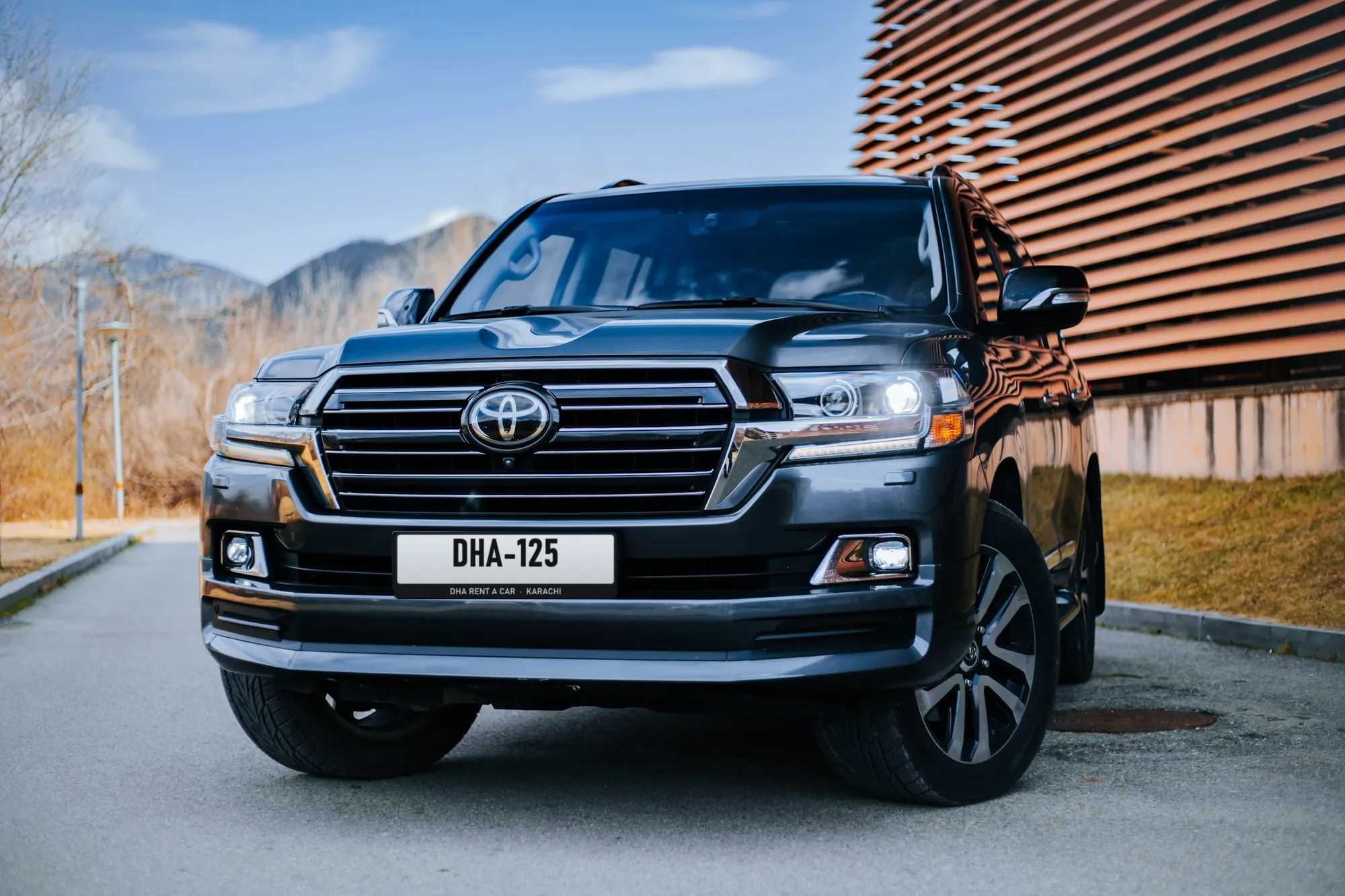 Black Toyota Land Cruiser parked facing the camera